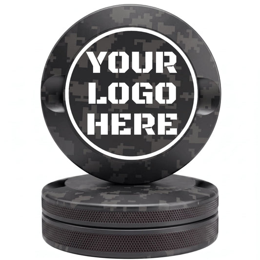 Black digital camouflage CNC-machined aluminum nicotine pouch tin with custom YOUR LOGO HERE laser engraving placeholder in white circle on lid with knurled sides on white background
